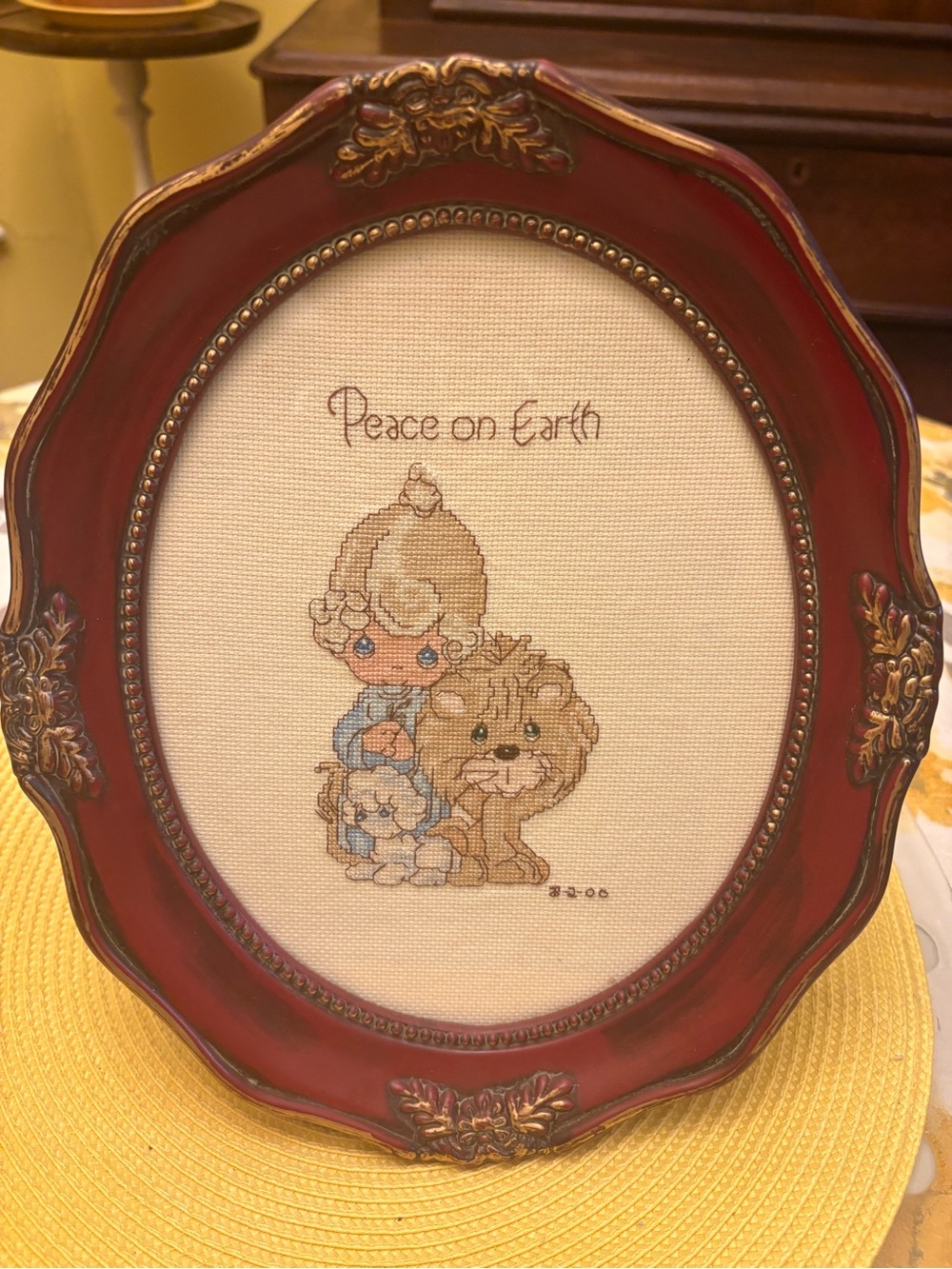 Peace on Earth Cross-Stitch Wall Art in Red Frame